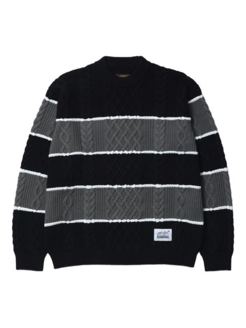 striped cable-knit sweater