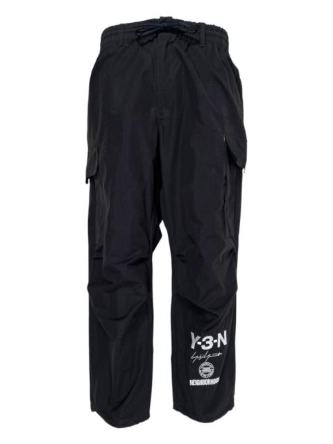 x Neighborhood logo-print cargo-pocket trousers