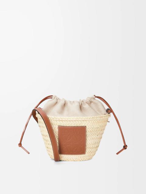 Drawstring bucket bag in palm leaf and calfskin
