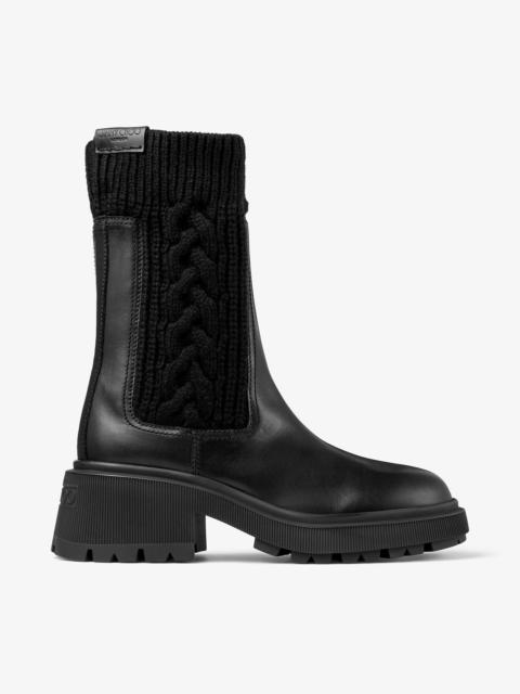 Tamia Flat
Black Shiny Calf Leather Ankle Boots with Cable Knit