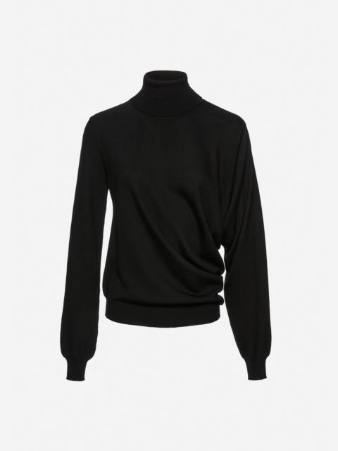 Wool draped turtleneck in black