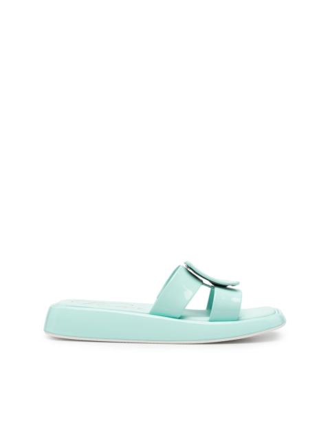 buckle-embellished slides