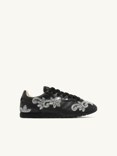 WINDSPIN SNEAKERS IN BLACK LEATHER WITH DECORATIONS