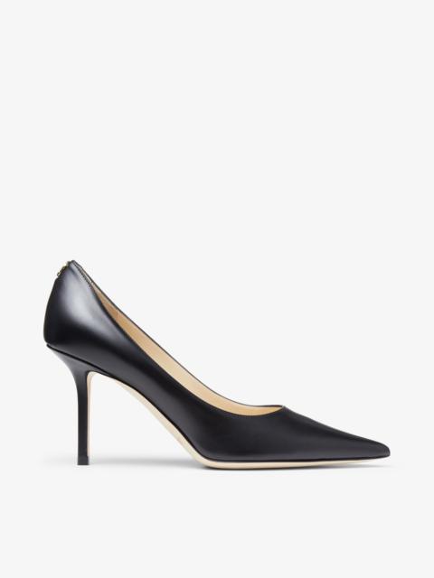 Love 85
Black Calf Leather Pumps with JC Emblem