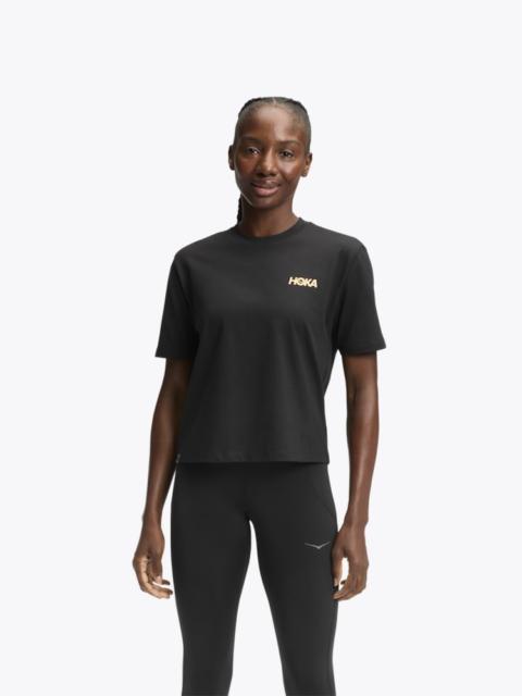 Women's HOKA Manifesto Short Sleeve Tee Shirt in Black/Gold