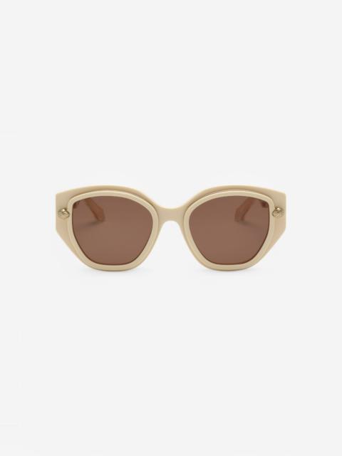 Wide and feminine front sunglasses with double ring decoration
