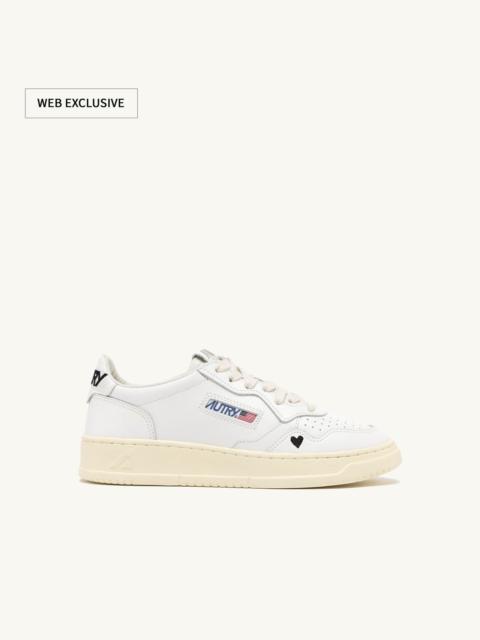 MEDALIST 'LOVE' SNEAKERS IN BLACK AND WHITE LEATHER