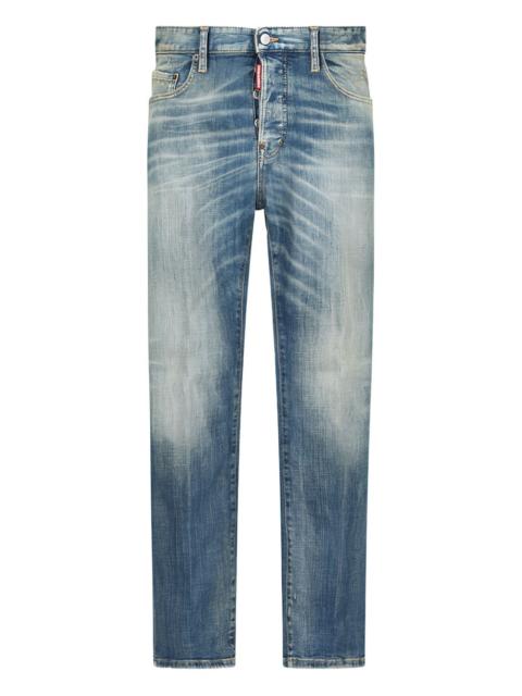 faded-wash distressed denim jeans