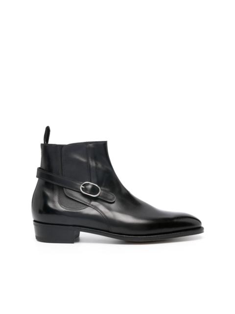 side-buckle polished leather boots