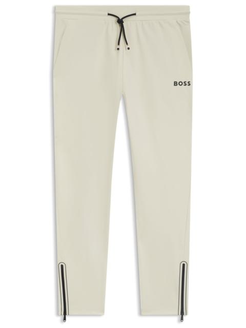 ACTIVE STRETCH-GABARDINE TRACKSUIT BOTTOMS WITH THERMOREGULATING TECHNOLOGY