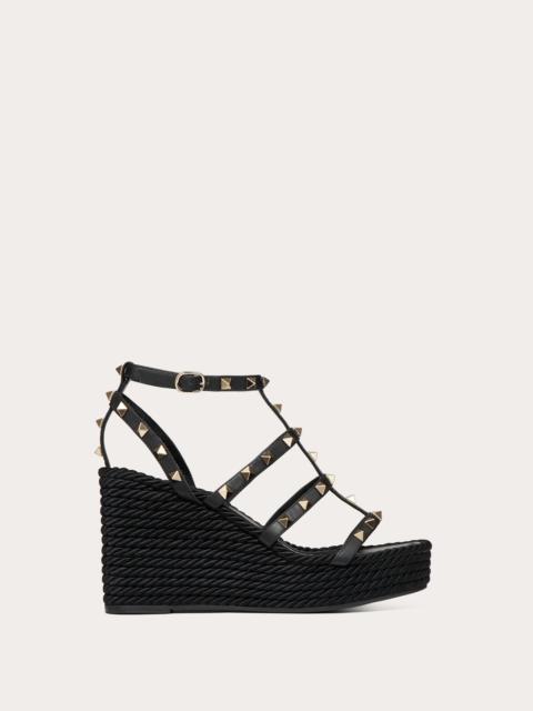 ROCKSTUD ANKLE STRAP WEDGE SANDAL IN CALFSKIN LEATHER 95 MM