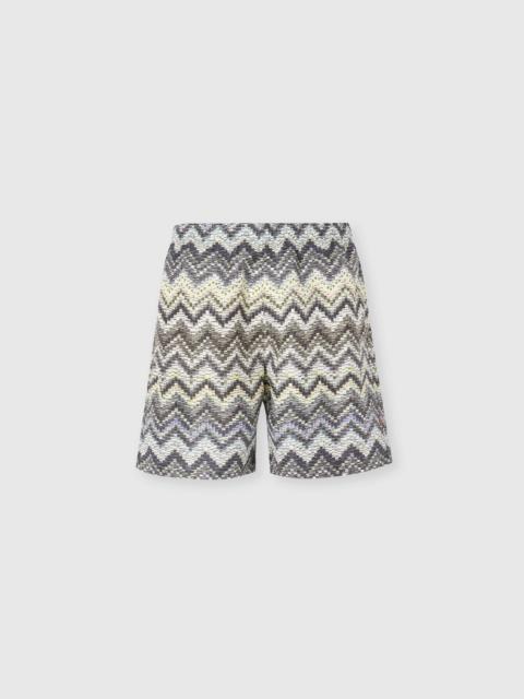 Long swim shorts with dashed zigzag print