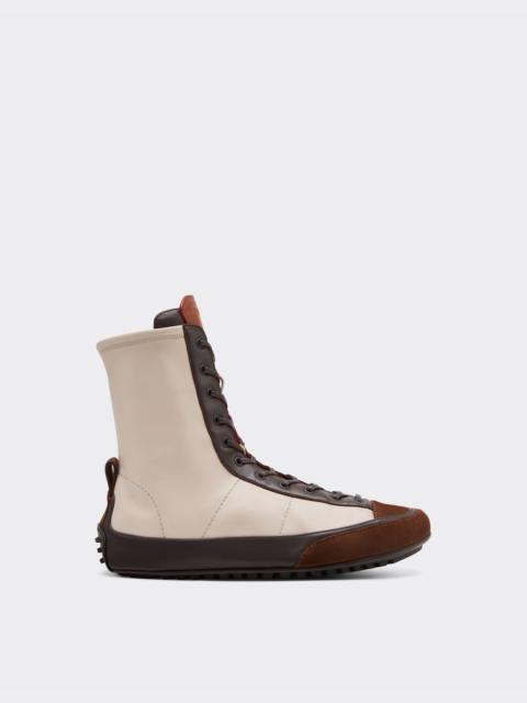 Nappa leather, suede and stretch fabric high-top driver sneaker