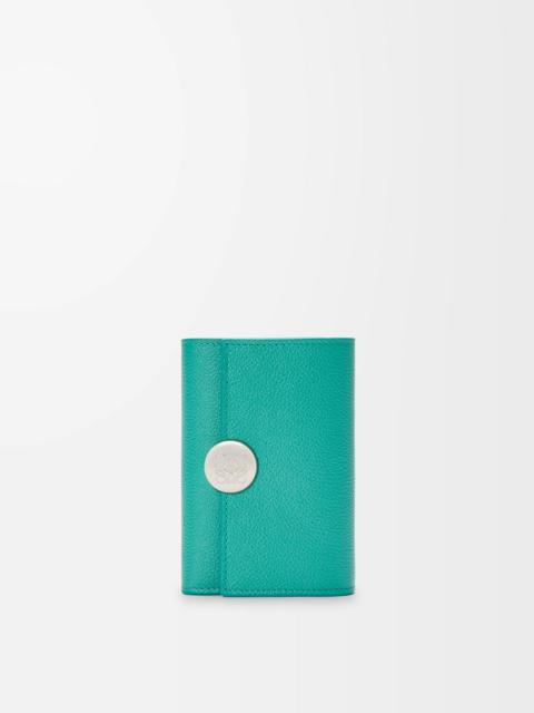Pebble small vertical wallet in pebble grained calfskin