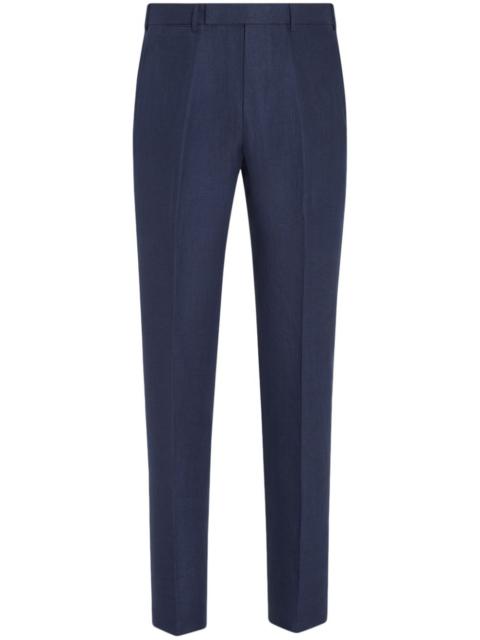 Oasi tapered-leg linen trousers