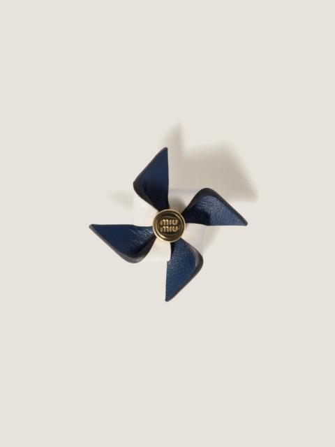 Leather pinwheel brooch