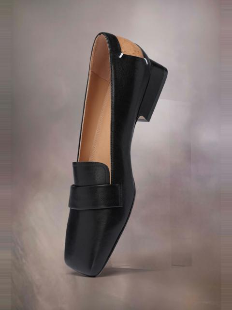 Four stitches décortiqué loafers