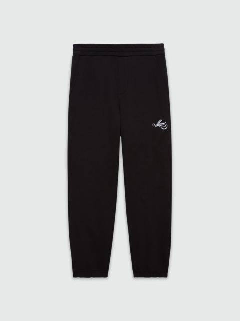 Black jersey joggers with cursive MSGM logo