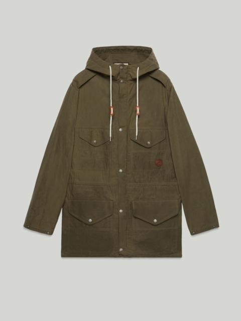 Waxed cotton adjustable length jacket