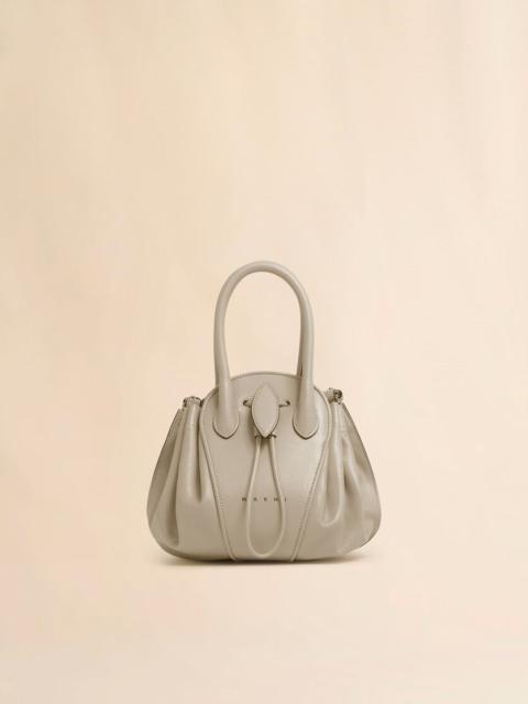TAUPE LEATHER TULIPEA SMALL HANDBAG