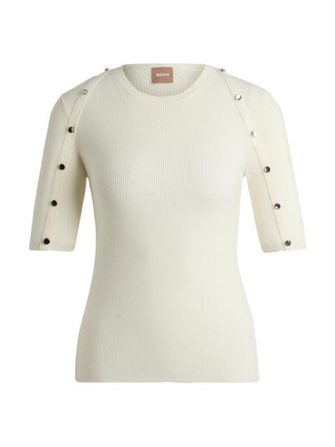 SHORT-SLEEVED SWEATER IN STRETCH FABRIC WITH HARDWARE DETAILS