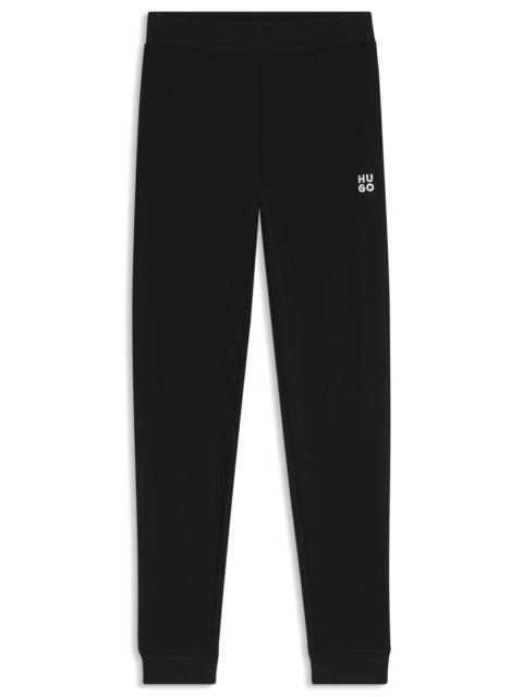 COTTON-TERRY TRACKSUIT BOTTOMS WITH STACKED LOGO