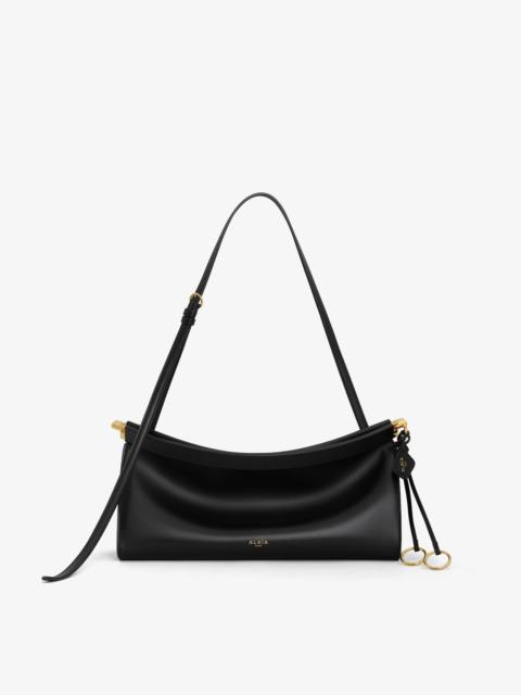LE CLICK EAST WEST MEDIUM BAG IN LEATHER