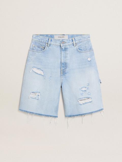 Women's Bermuda shorts in lived-in effect denim