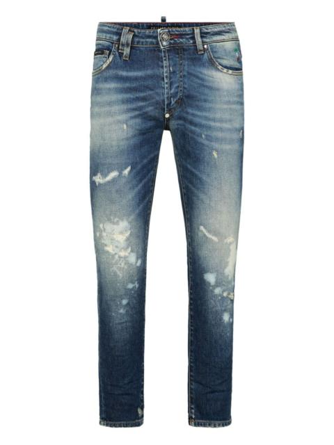 distressed paint-splatter jeans