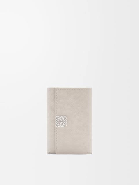 Anagram small vertical wallet in pebble grained calfskin