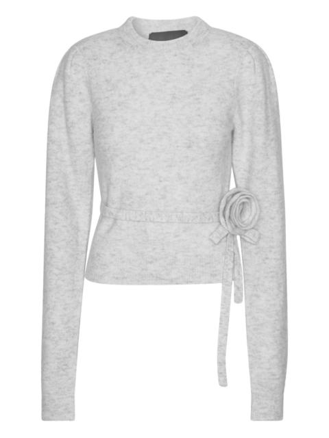 rose-embellished top