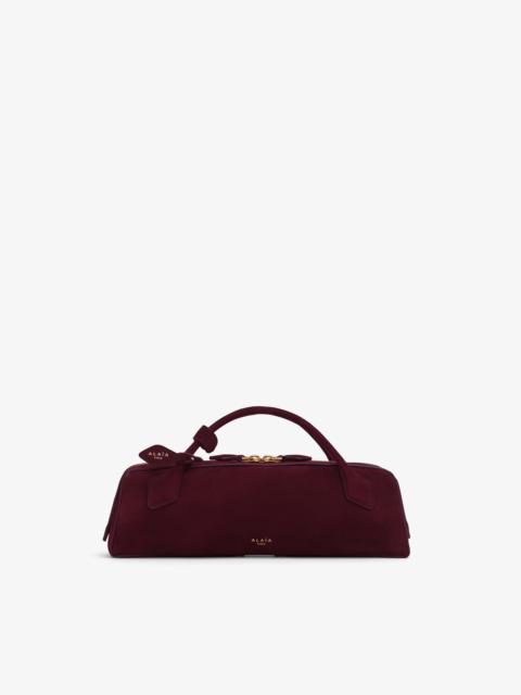 LE TECKEL CLUTCH IN SUEDE GOATSKIN