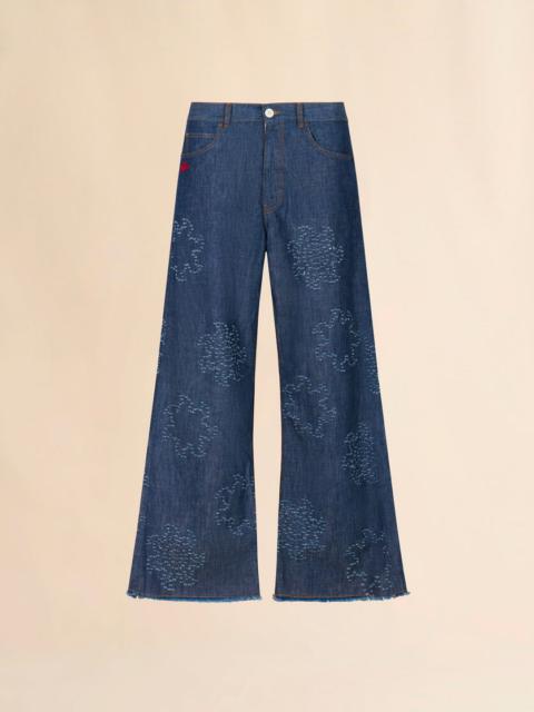 BLUE CHAMBRAY JEANS WITH FRAYED SUN MOTIF
