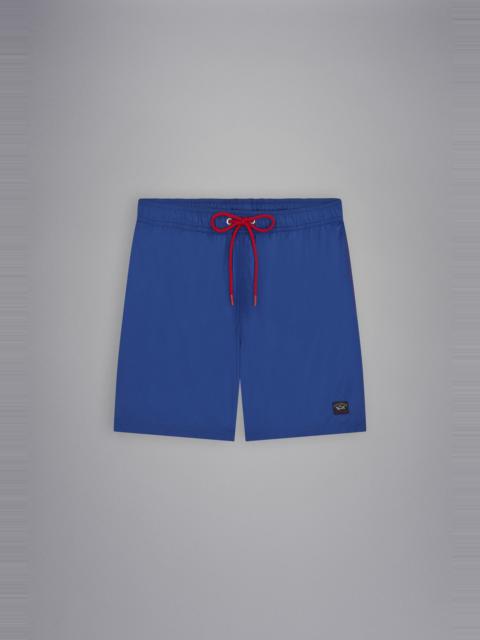 SWIM SHORTS WITH ICONIC BADGE