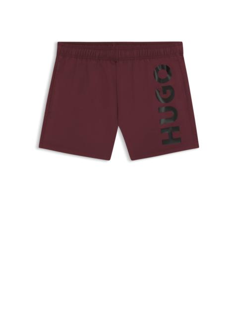 SWIM SHORTS WITH VERTICAL LOGO PRINT