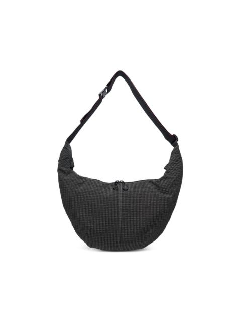 grid-pattern shoulder bag