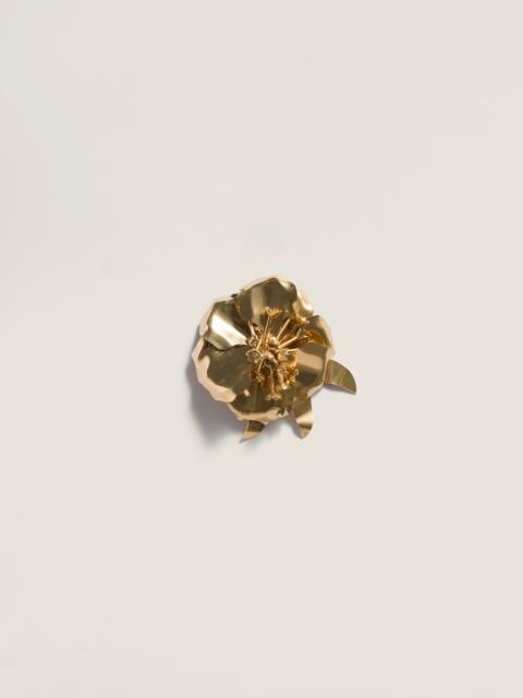 Metal brooch with crystals