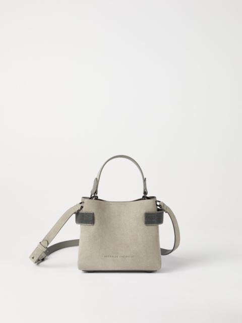 Essence small top-handle bag in suede with precious bands