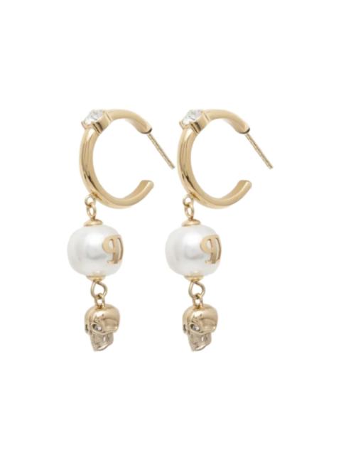 skull-charm hoop earrings