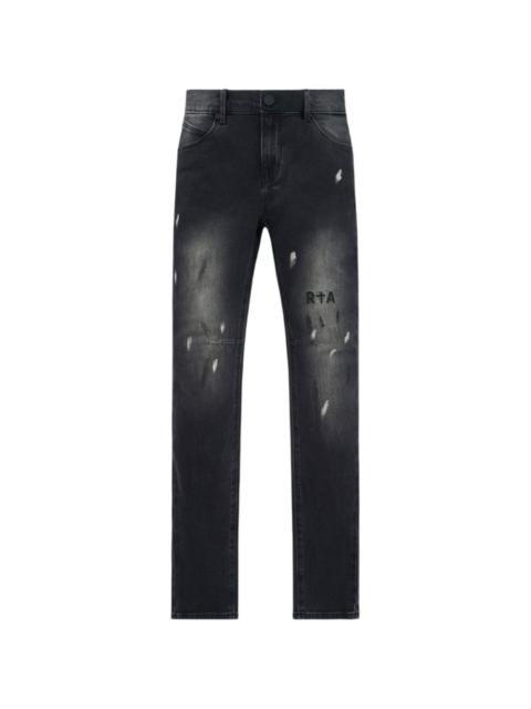 Bryant paint-splatter logo jeans