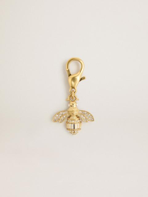 Bee-shaped charm in gold-colored brass with crystals