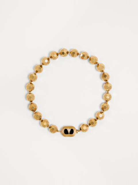 OVALETTE NECKLACE IN RESIN, ENAMEL, METAL AND SWAROVSKI® CRYSTALS