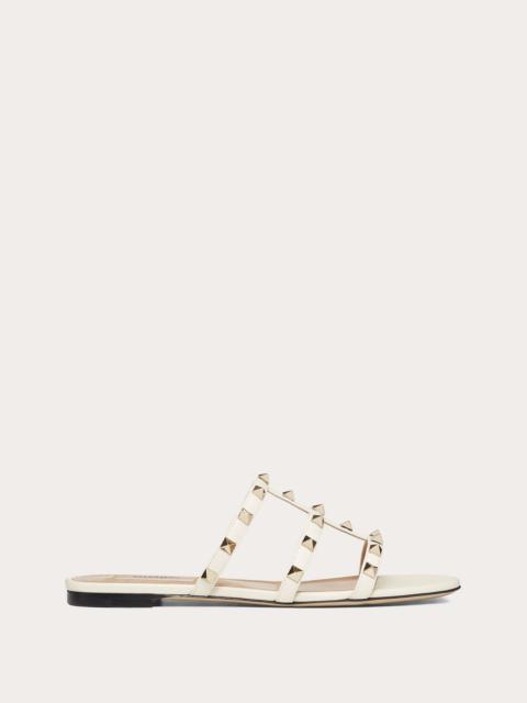 Rockstud flat calfskin slide sandal