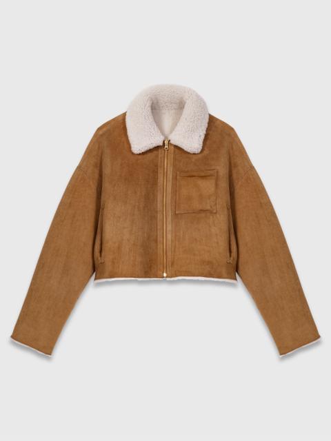 Reversible shearling coat