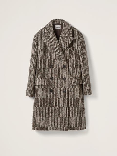 Double-breasted bouclé coat
