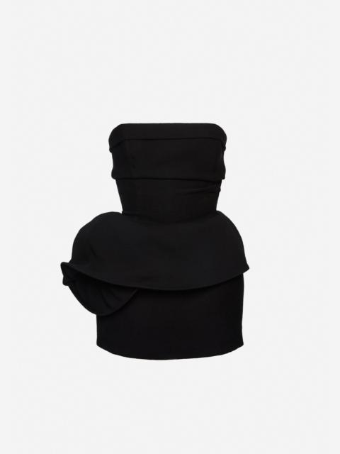 Strapless mini dress with sculptural peplum in black
