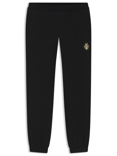 YEAR OF THE HORSE LOGO-ARTWORK TRACKSUIT BOTTOMS IN COTTON TERRY