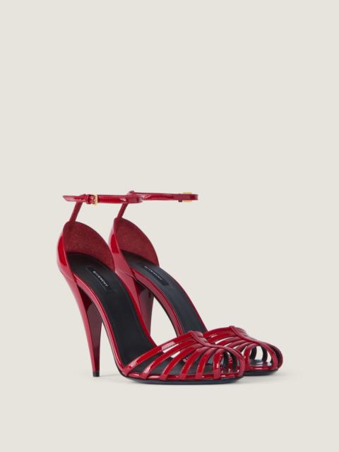 CAGE HEELED SANDALS IN PATENT LEATHER