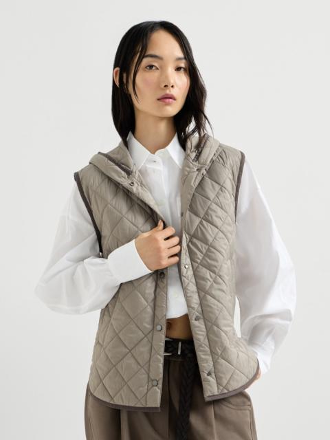 Lightweight matte nylon quilted vest with Thermore® padding and hood