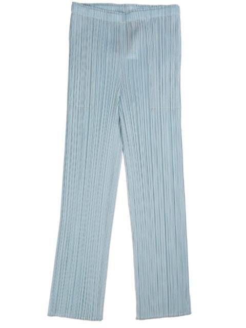 plissÃ©-effect slim-fit trousers